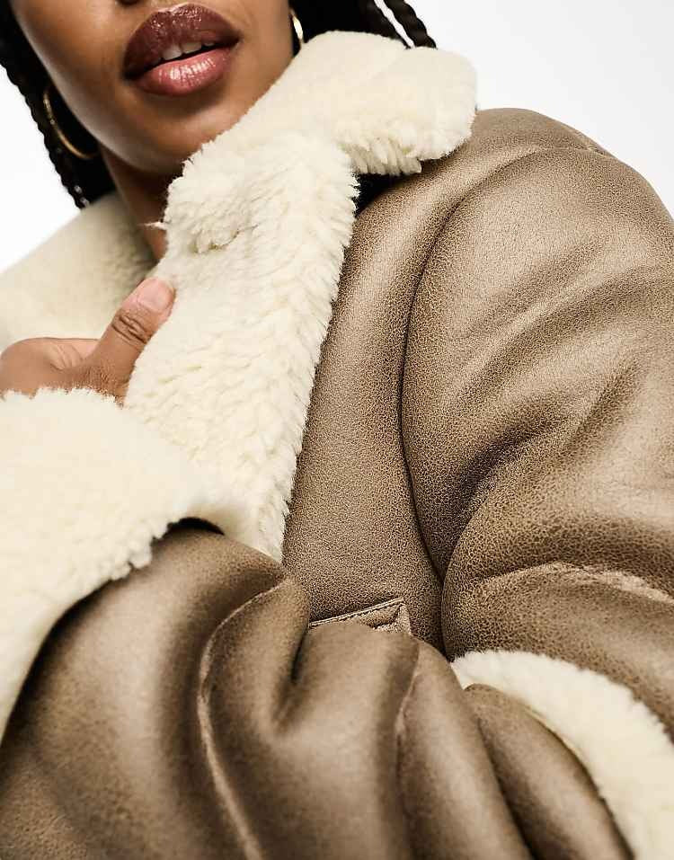 Veste aviateur courte en imitation peau de mouton