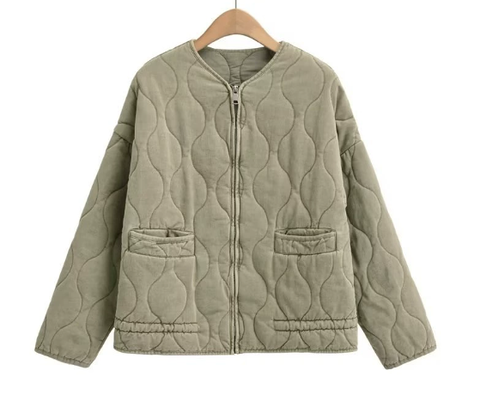 Veste matelassée vintage avec détails classiques de couture
