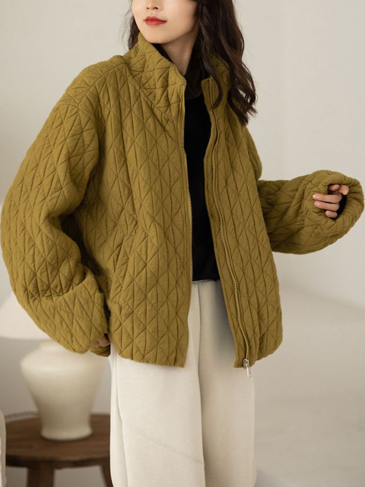 Veste à col montant texturé avec poches latérales