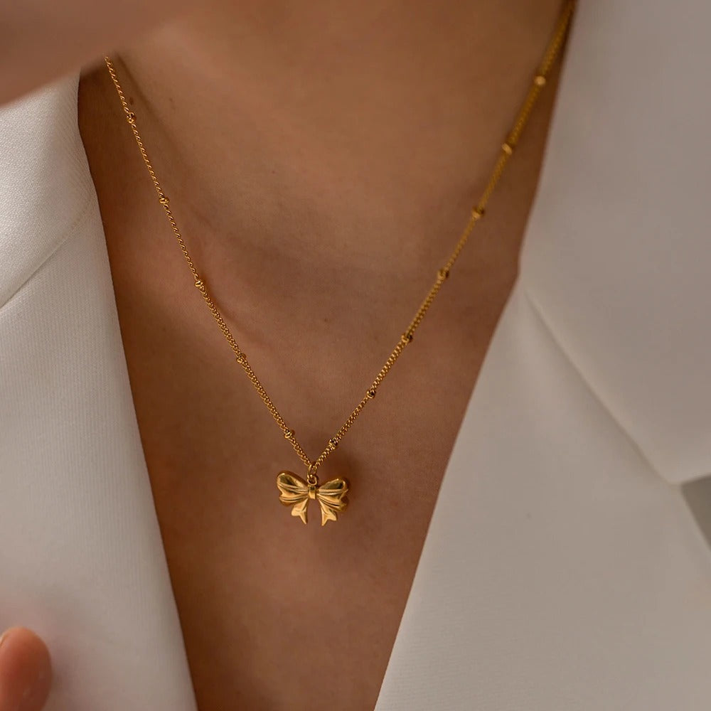 Élodie Lavin® | Collier doré pendentif nœud romantique