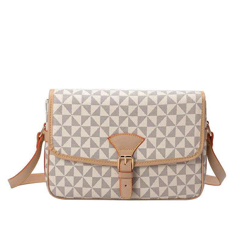 Sac à bandoulière en cuir à motifs