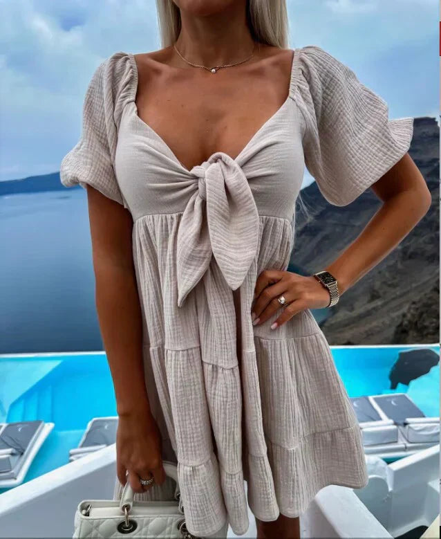 Robe à manches boutonnées dans un style estival charmant