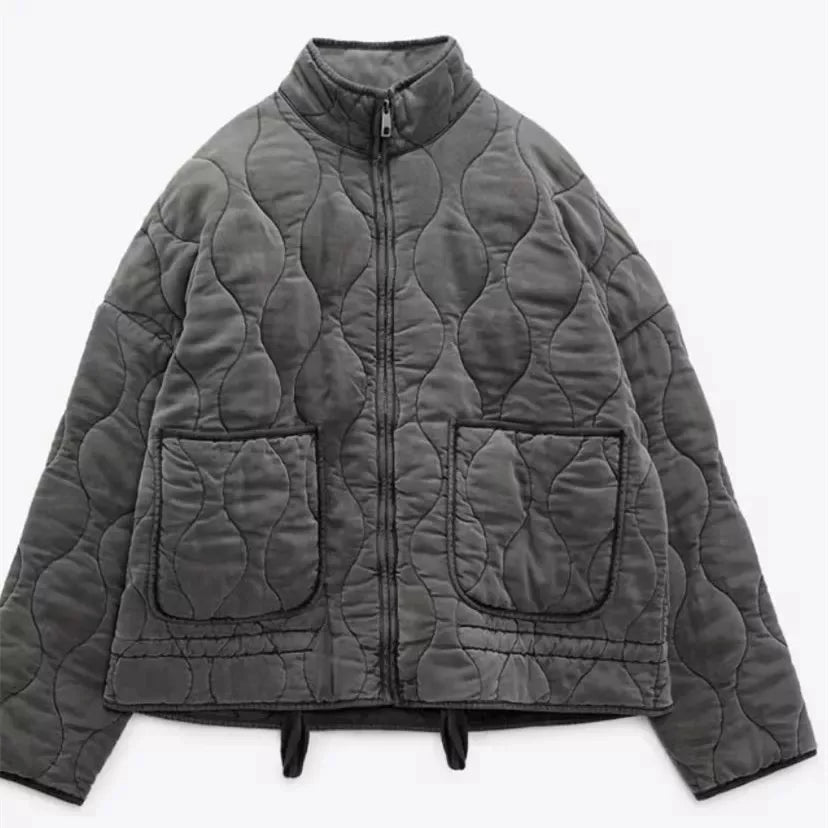 Veste matelassée vintage avec détails classiques de couture