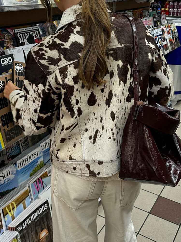 Veste à col cranté imprimé vache avec boutons pression stylés