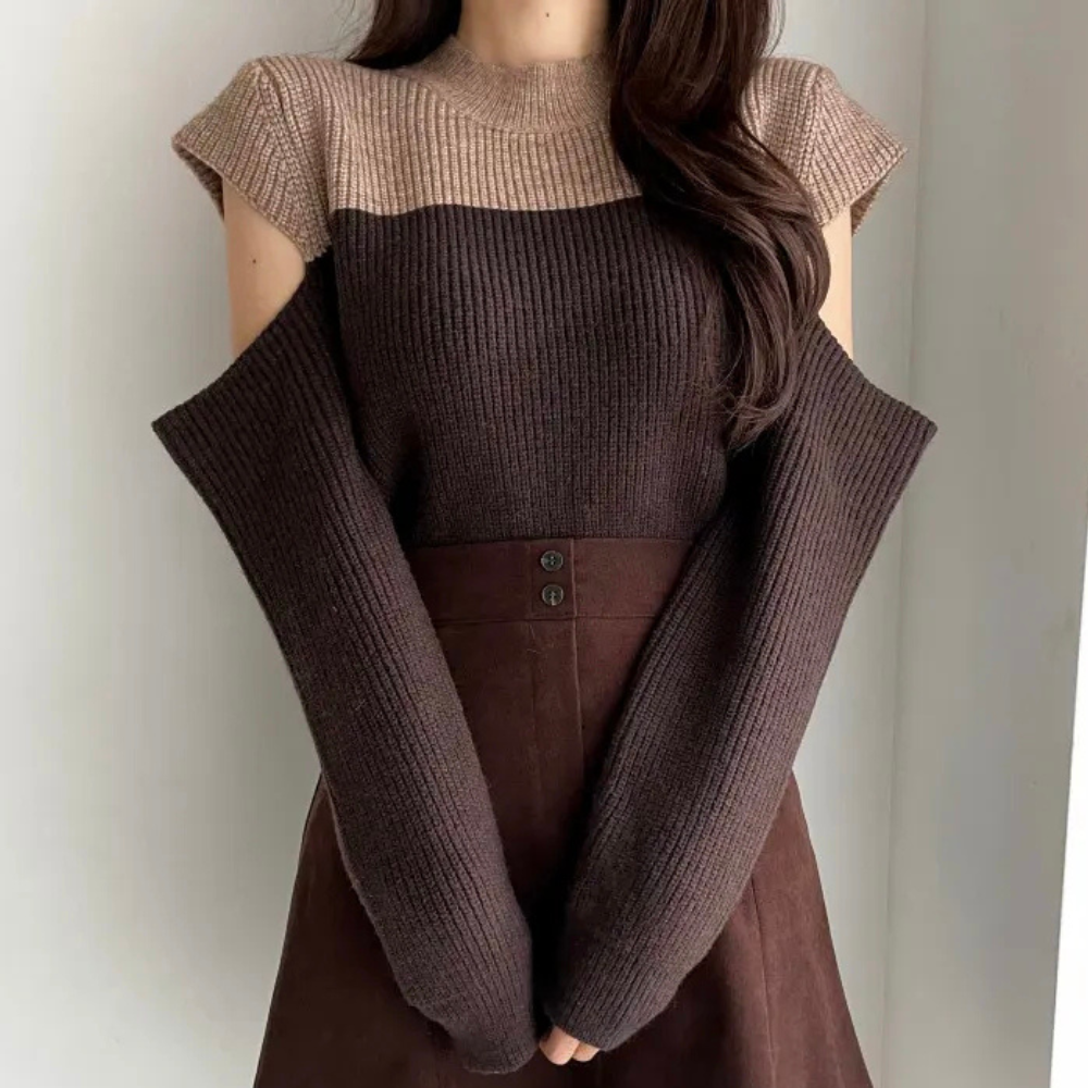 Pull en tricot bicolore avec manches ajourées