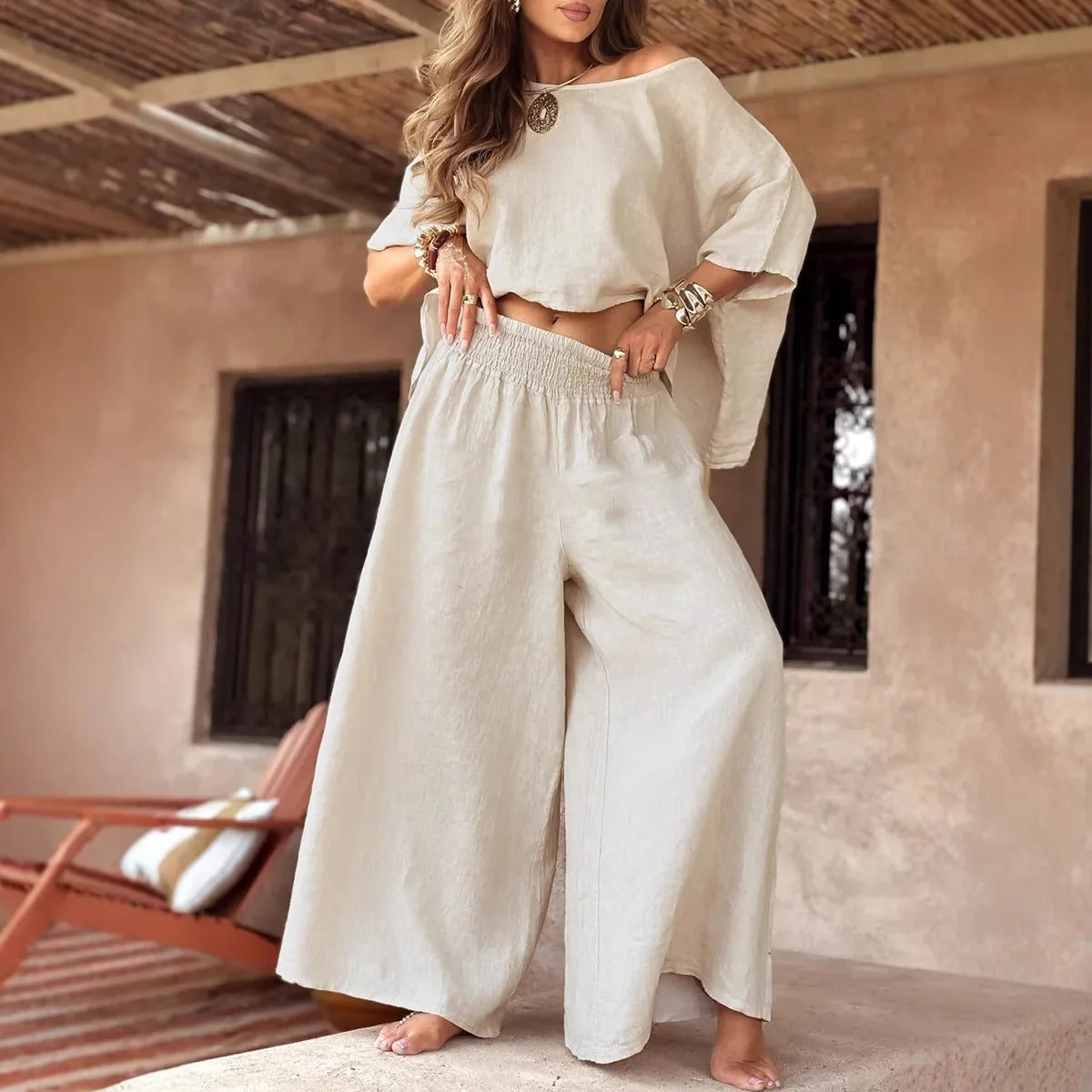 Ensemble deux pièces épaules dénudées avec pantalon à jambes larges