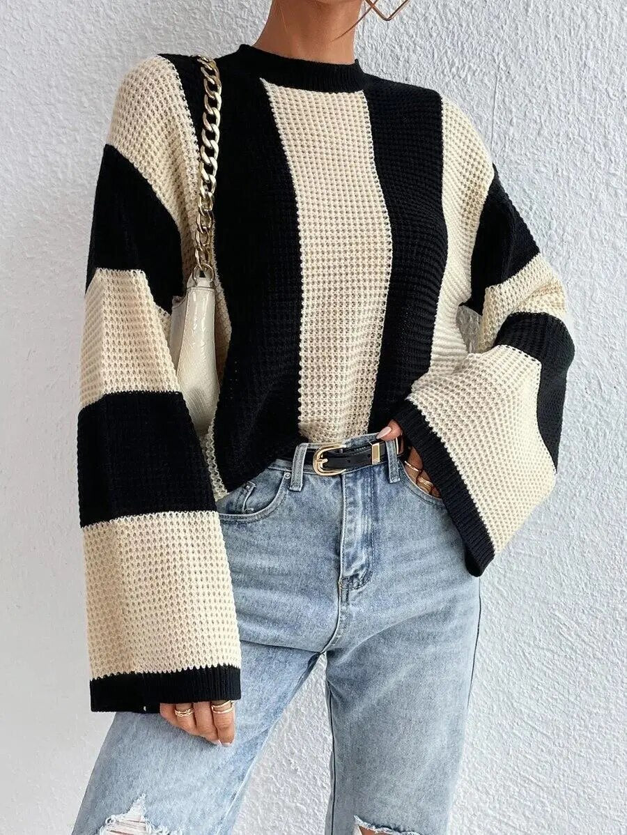 Pull douillet bicolore en maille avec détail aux larges manches