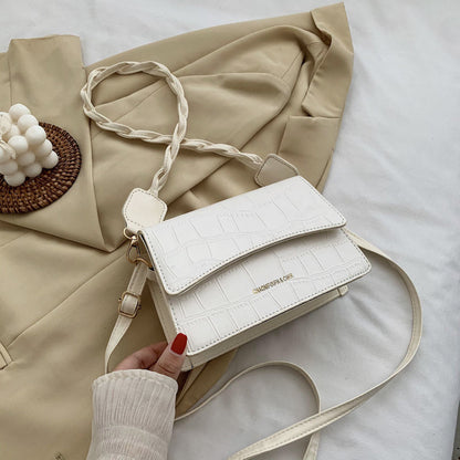 Sac à bandoulière en cuir texturé à anse tressée