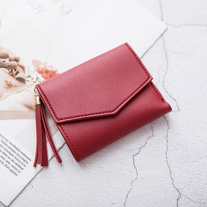 Portefeuille en cuir grainé triple volet