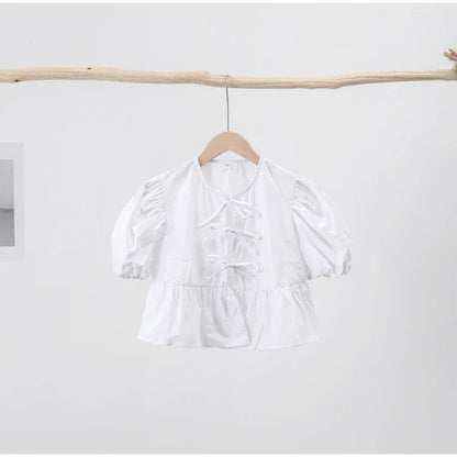 Blouse à manches bouffantes imprimé léopard avec détail nœud