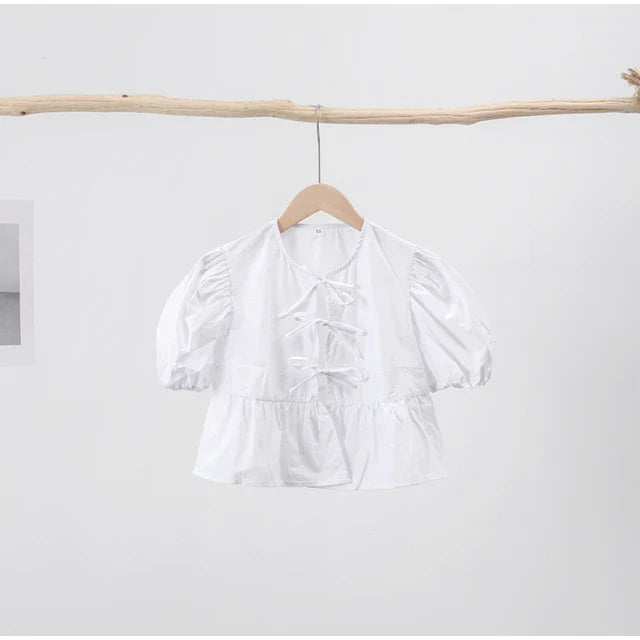 Blouse à manches bouffantes imprimé léopard avec détail nœud