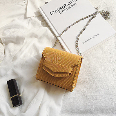 Petit sac à bandoulière en cuir  texturé rond ou carré