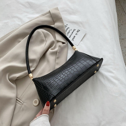 Sac baguette en cuir texturé