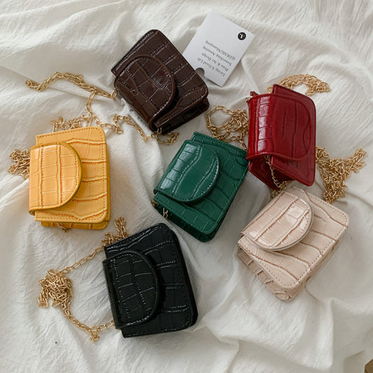 Sac à bandoulière en cuir texturé brillant