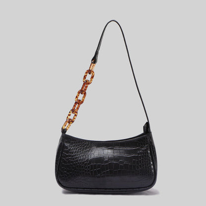 Sac à main en cuir texturé avec chaîne