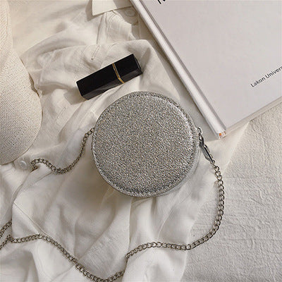 Petit sac à bandoulière en cuir  texturé rond ou carré