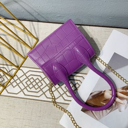 Petit sac à main en cuir texturé