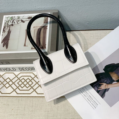 Petit sac à main en cuir texturé