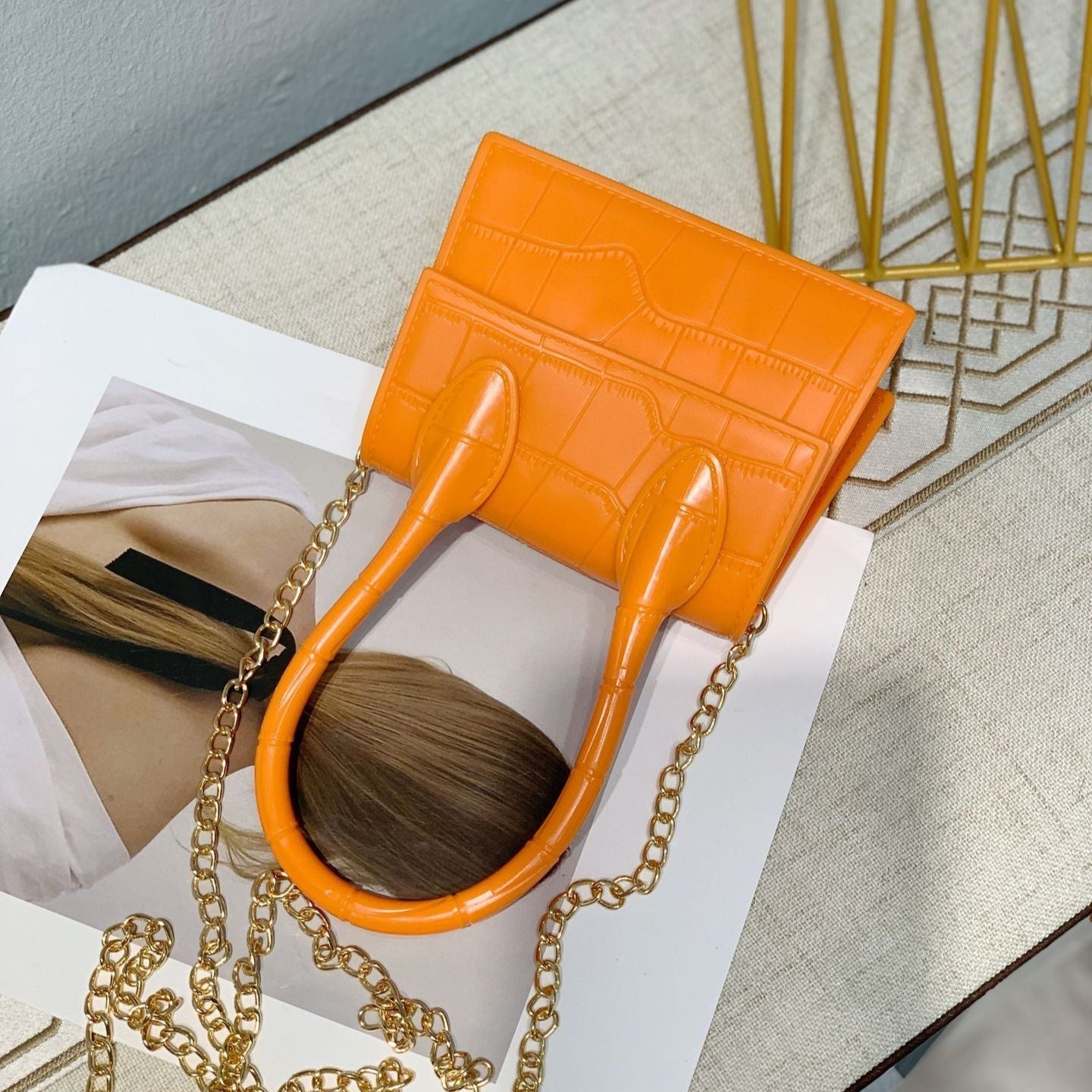 Petit sac à main en cuir texturé