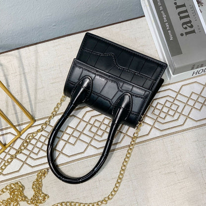 Petit sac à main en cuir texturé