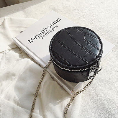 Petit sac à bandoulière en cuir  texturé rond ou carré