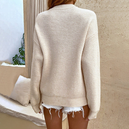 Pull en maille confortable avec col boutonné chic