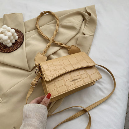 Sac à bandoulière en cuir texturé à anse tressée