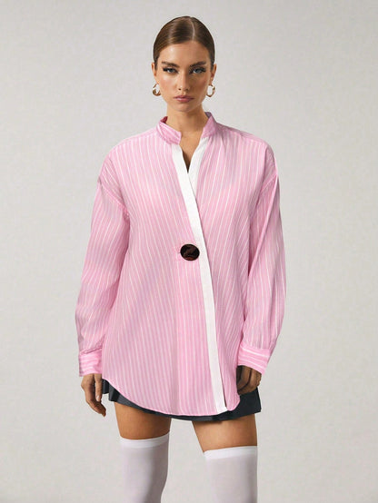 Chemise longue à rayures avec fermeture en métal