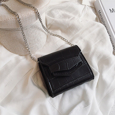 Petit sac à bandoulière en cuir  texturé rond ou carré