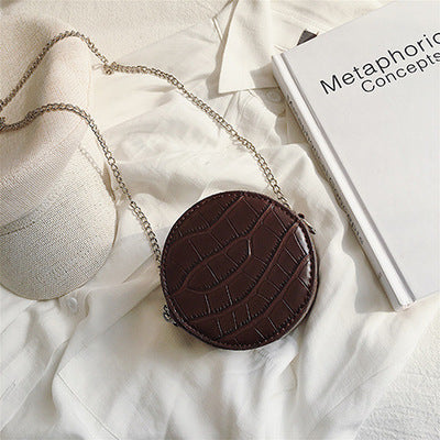 Petit sac à bandoulière en cuir  texturé rond ou carré