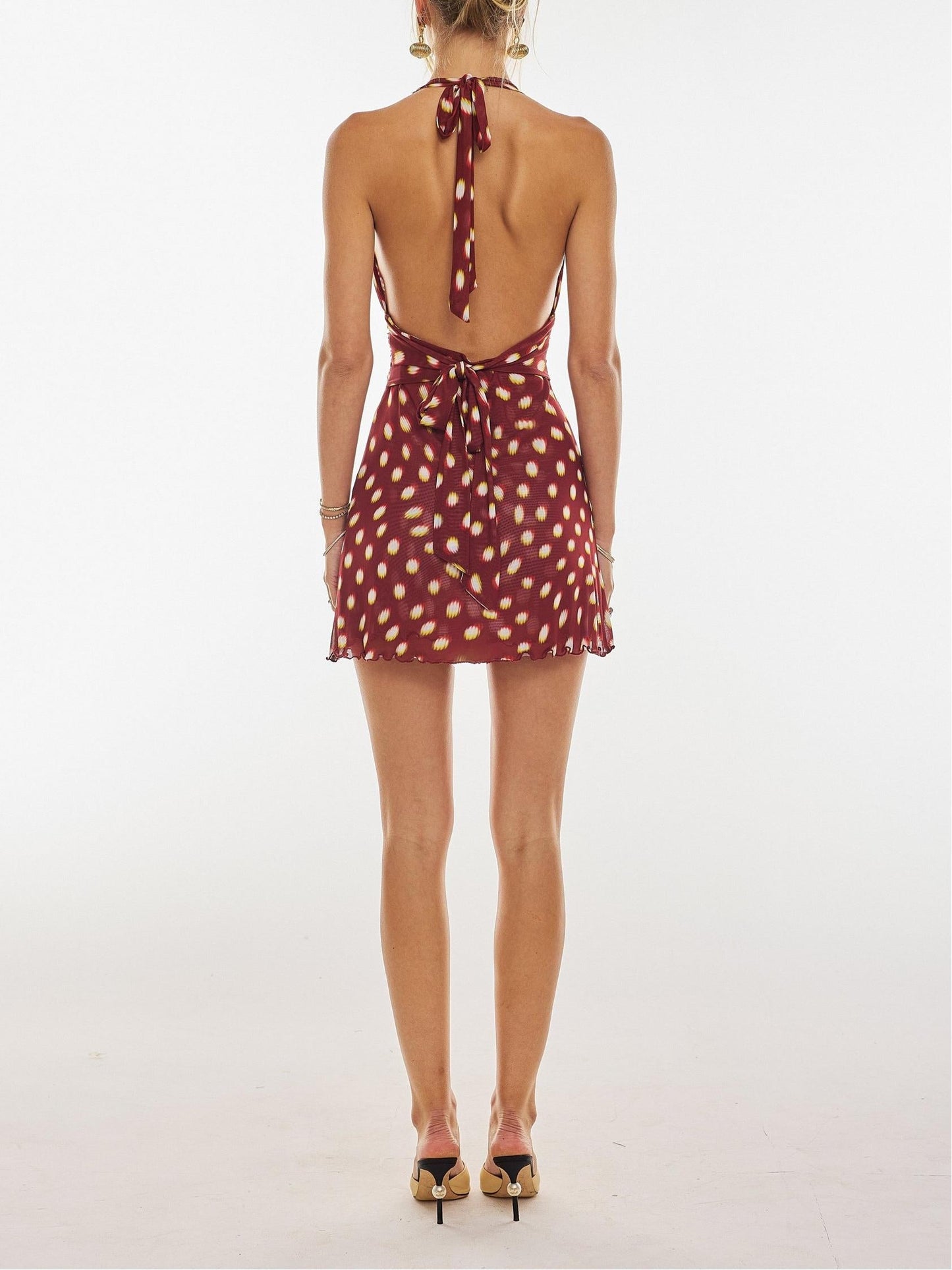 Mini-robe en lycra à pois et coupe ajustée