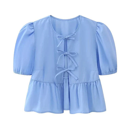Blouse à manches bouffantes imprimé léopard avec détail nœud
