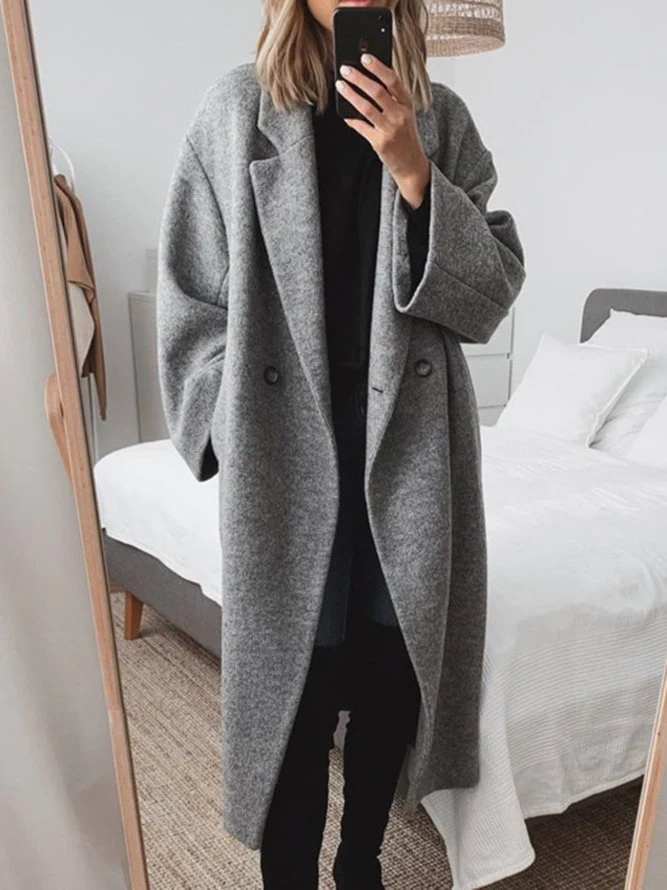 Manteau élégant long ample à double boutonnière