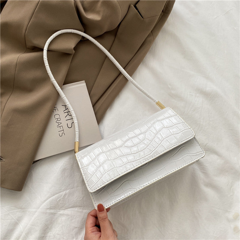 Sac baguette en cuir texturé