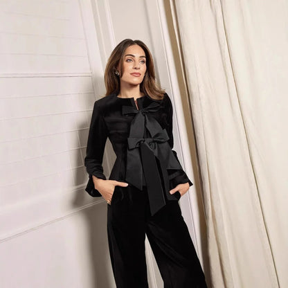 Veste péplum en taffetas sur mesure avec nœud en velours