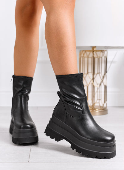 Bottines noires extensibles à plateforme épaisse