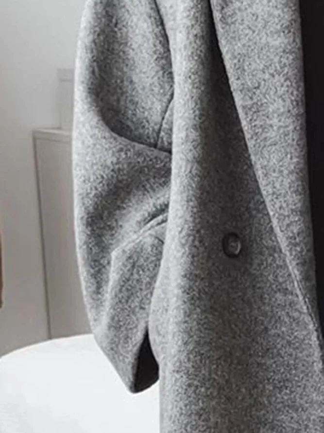 Manteau long élégant ample à double boutonnière