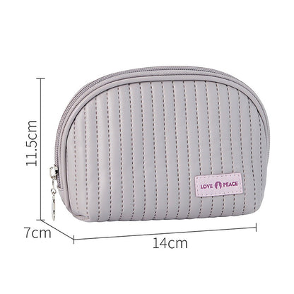 Trousse de maquillage en cuir matelassé