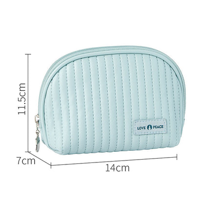 Trousse de maquillage en cuir matelassé