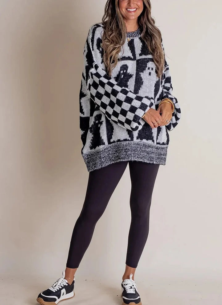 Pull en tricot à carreaux d'Halloween