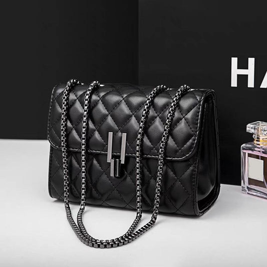 Sac à bandoulière en cuir matelassé noir
