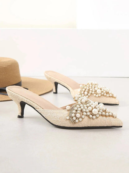 Élégantes mules à talon en perles