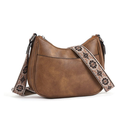 Sac à bandoulière à motifs en cuir