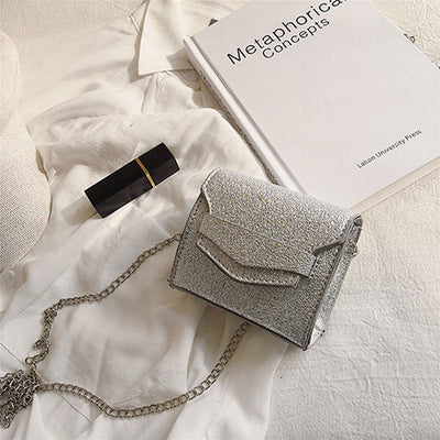 Petit sac à bandoulière en cuir  texturé rond ou carré