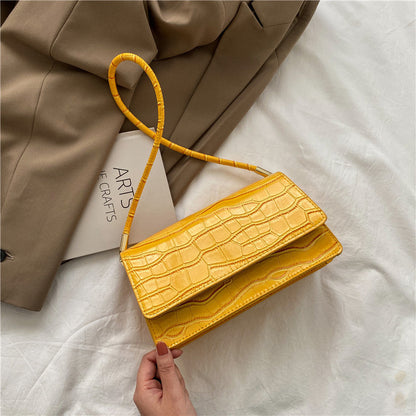 Sac baguette en cuir texturé