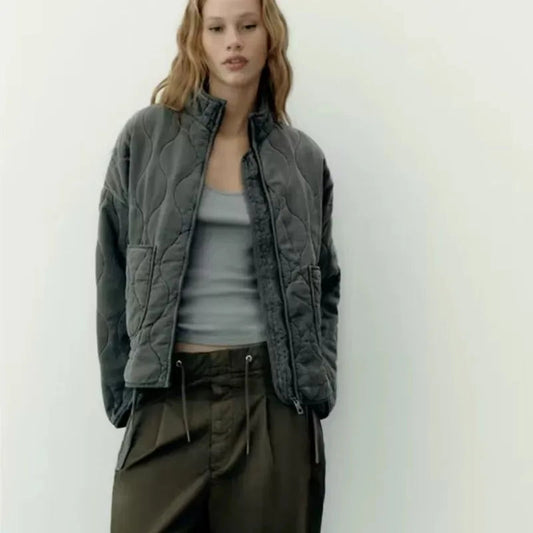 Veste matelassée vintage avec détails classiques de couture