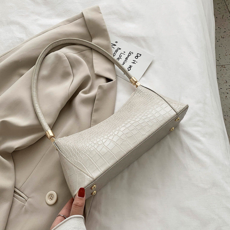 Sac baguette en cuir texturé