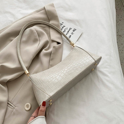 Sac baguette en cuir texturé