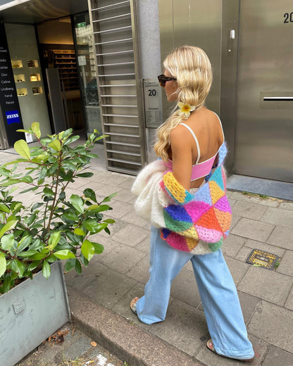Confortable pull-over en maille structurée avec détails accentués