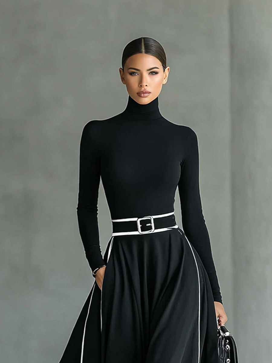 Robe longue noire col montant manches longues ceinturée avec surpiqûres